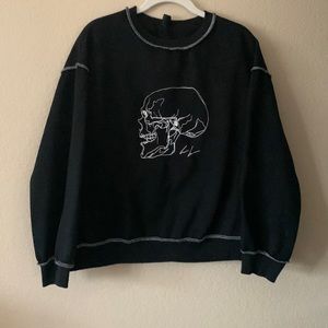 Black sweater with a skull. Size Small from SHEIN